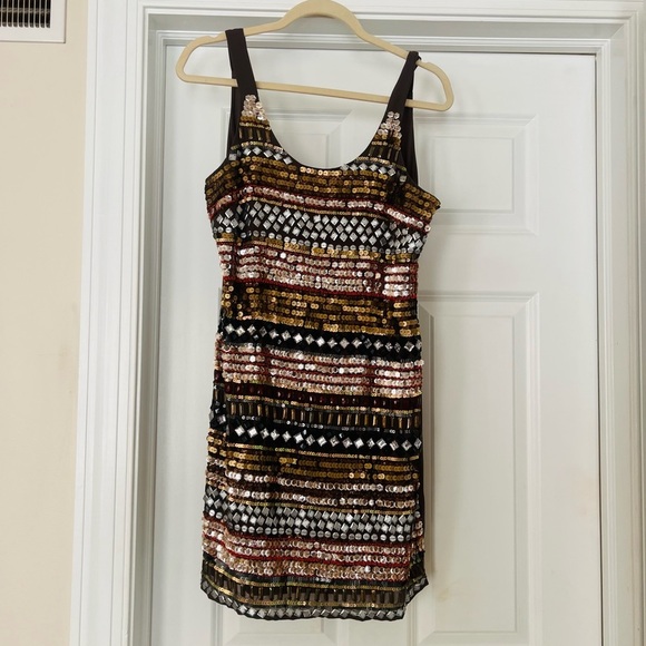 Romeo & Juliet Couture Dresses & Skirts - fabulous never worn Beaded dress by Romeo and Juliet size medium.